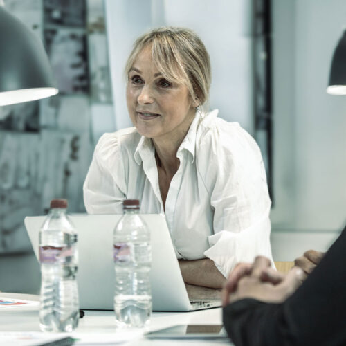 Leadership and culture: Female manager at a meeting
