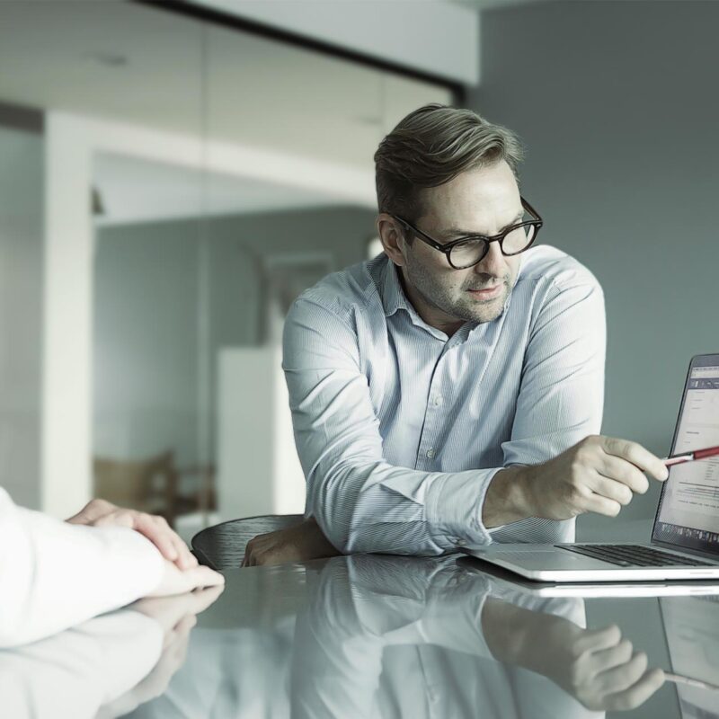 Manager giving feedback to colleague