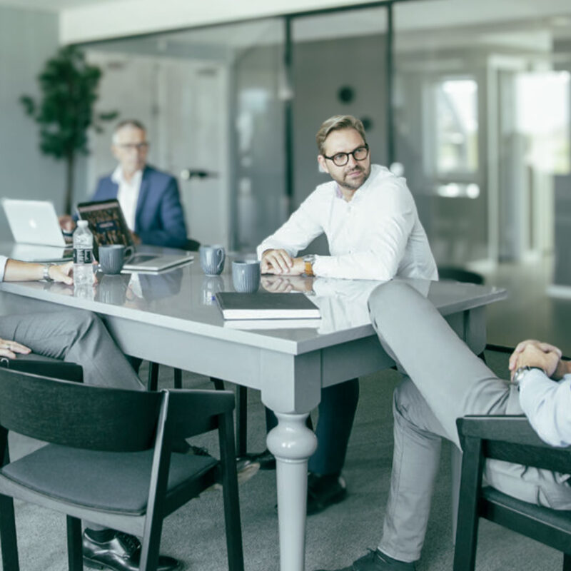 Meeting between professionals, reviewing sales