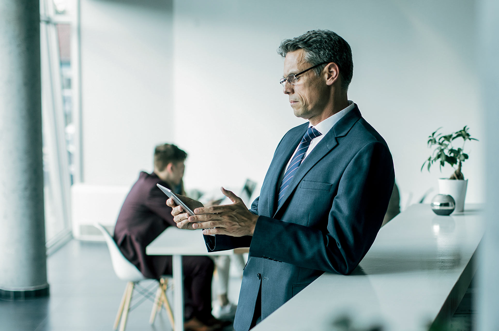 Older businessman reviewing case before presentation